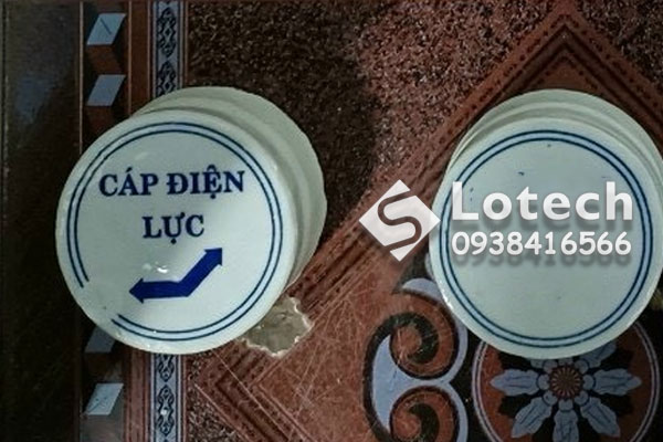 moc-su-bao-cap-dien-luc-2-mui-ten Mốc sứ báo cáp điện lực 2 mũi tên